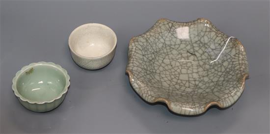 A Chinese celadon crackle glaze brush washer, a similar tea bowl and a celadon glazed tea bowl